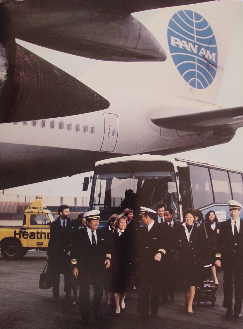 1980s A Pan Am crew arrives at their outbound aircraft at London, Heathrow airport.